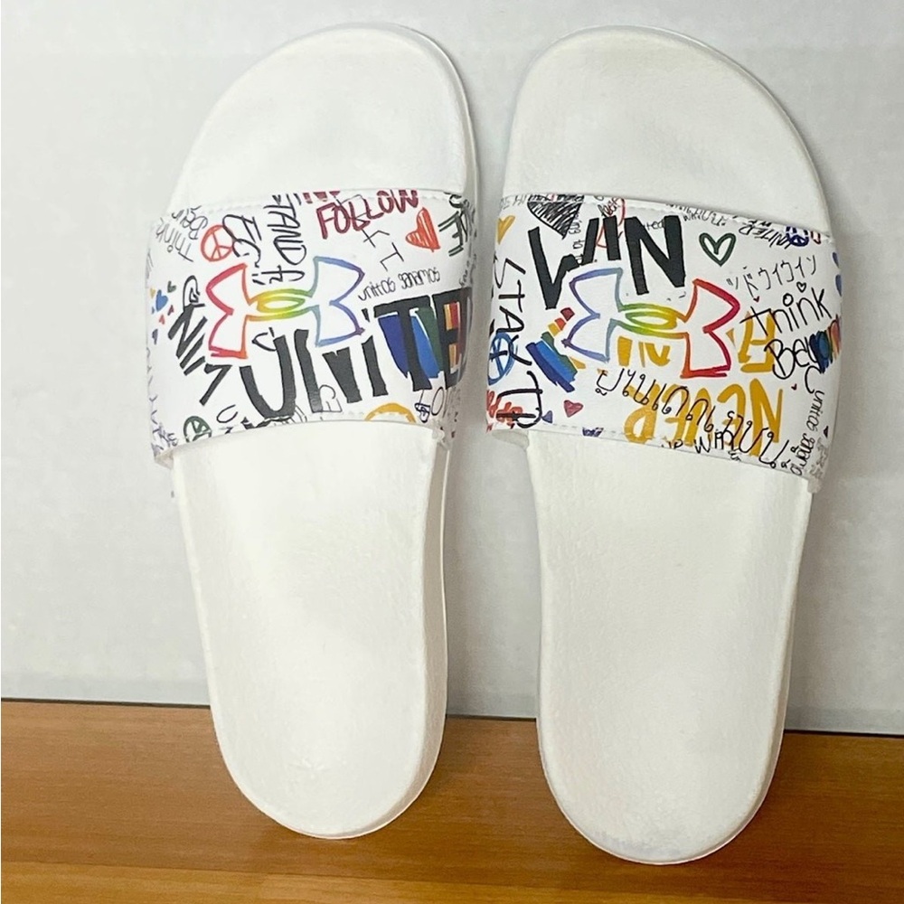 Under Armour Unisex slides size 9.5 women’s or 8 men’s- new w/ out tags/box